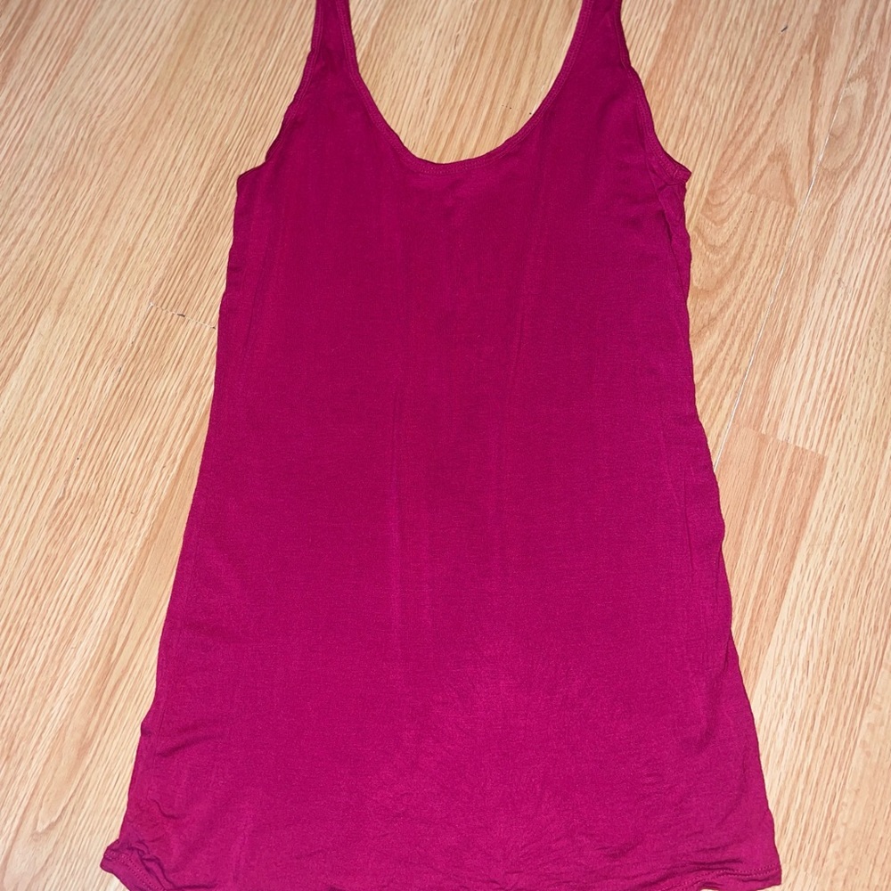 Tees is size small magenta long tank